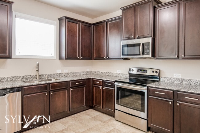 Building Photo - Embrace the charm of this 4 BR, 2.5 BA home