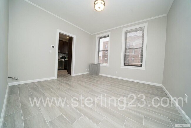 Building Photo - RENOVATED TWO BEDROOM BY THE E, M & R IN A...