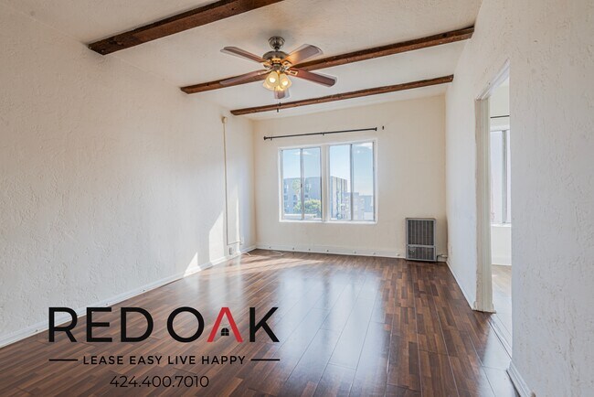 Building Photo - ~1 Month FREE~ Gorgeous Studio with Hardwo...