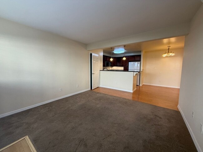 Building Photo - Upgraded Condo with Private Patio, AC, Pool, Gym, and Covered Parking in Gated Community