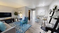 Located at 2616 Mission Rd in Tallahassee, FL, this well-designed one-bedroom, one-bathroom residence offers a smart and functional layout across a single floor. Wood-look flooring flows throughout, lending a cohesive and clean aesthetic to every room.

The living area is bright and welcoming, featuring a large window that fills the space with natural light and offers a view of the surrounding greenery. A track lighting fixture adds additional illumination, complementing the open, airy feel of the room.

The galley-style kitchen is efficiently organized with dark cabinetry, granite-style countertops, and stainless steel appliances including a full-size refrigerator, microwave, and range. A charming arched window at the end of the kitchen brings in natural light.

The bedroom is a comfortable retreat, highlighted by a ceiling fan, a sliding glass door that invites abundant natural light and outdoor views, and direct access to two closets, providing generous storage. The bathroom features a clean, full-size tub and shower combination.

Neutral gray walls throughout the residence create a calm, versatile backdrop. With two closets and a practical room arrangement, this residence offers a well-rounded living experience in Tallahassee.