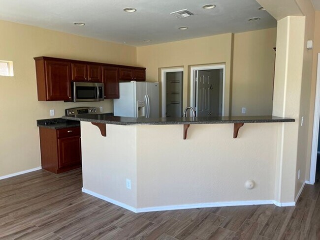 Building Photo - 3 bedroom and 2 1/2 bath home with a pool ...
