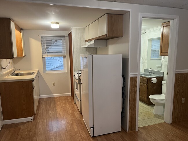 Kitchen and bath area - 11 W Oak St