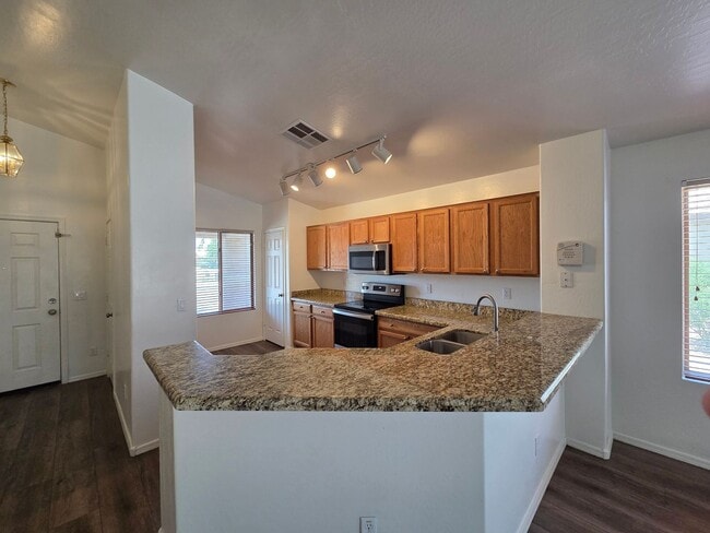 Building Photo - Goodyear 3 Bedroom / 2 Bath with RV Gate!
