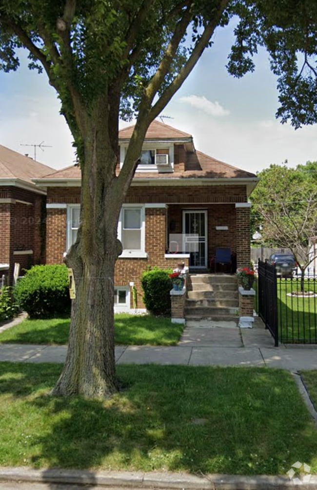 Building Photo - 10422 S Calhoun Ave