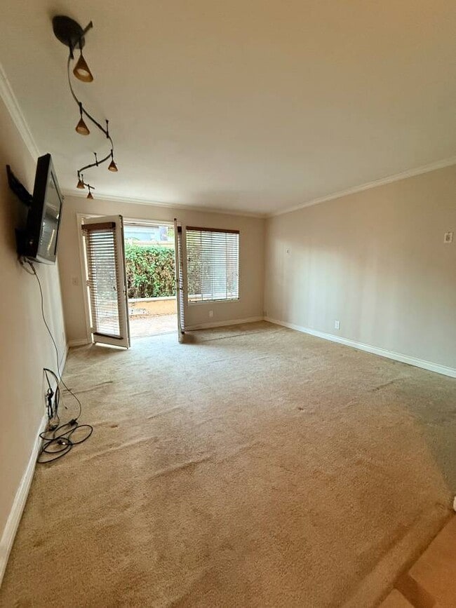 room with french doors to patio - 466 Fresh Meadows Rd