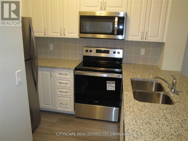 Photo du bâtiment - 349-1349 Rathburn Rd W