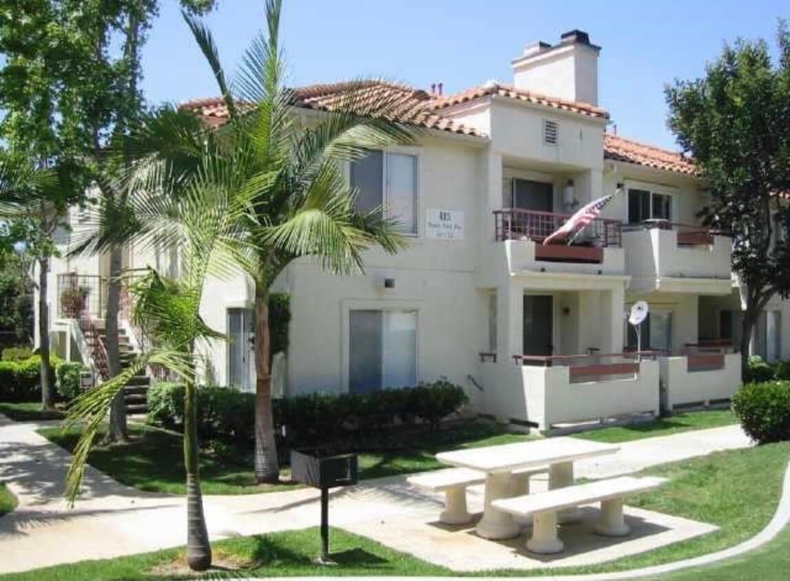 Unit 112 is located on the back side of this building - 415 Stoney Point Way