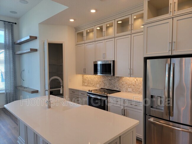Foto del edificio - 7437 Beach Walk Place