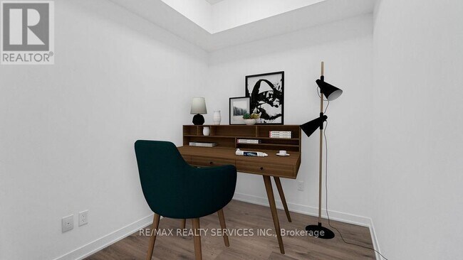 Photo du bâtiment - 405-405 Dundas St W