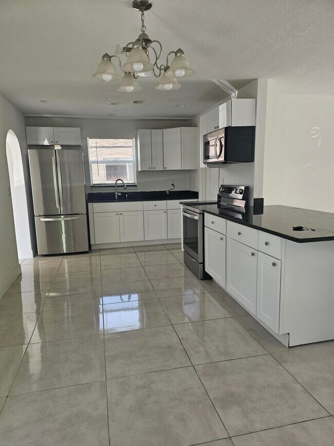 Foto del edificio - 1142 W 23rd St