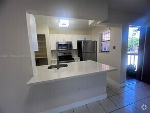 Building Photo - 6560 W 27th Ct
