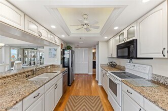 Building Photo - 6361 Pelican Bay Blvd