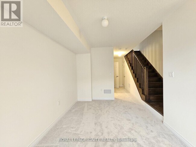 Building Photo - 919 Crowsnest Holw