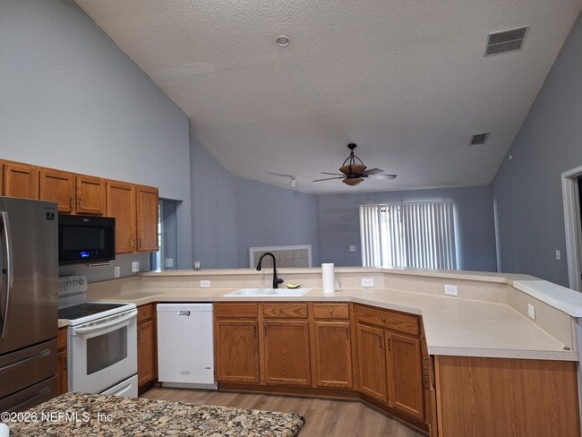 Building Photo - 513 White Jasmine Way