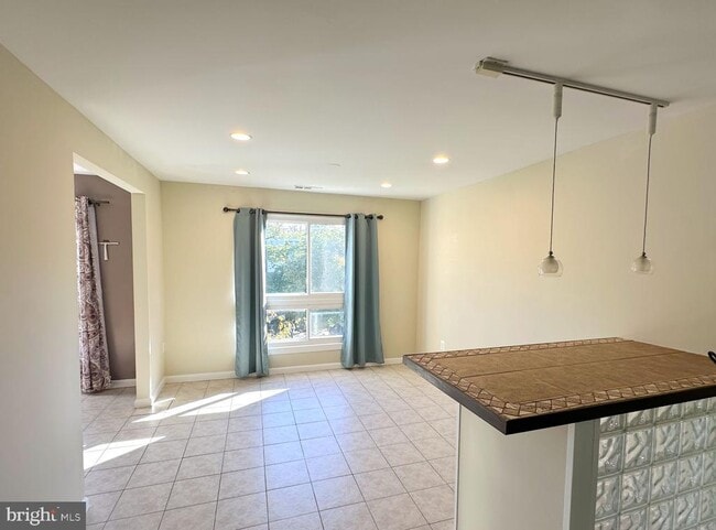 Building Photo - 3940 Bel Pre Rd