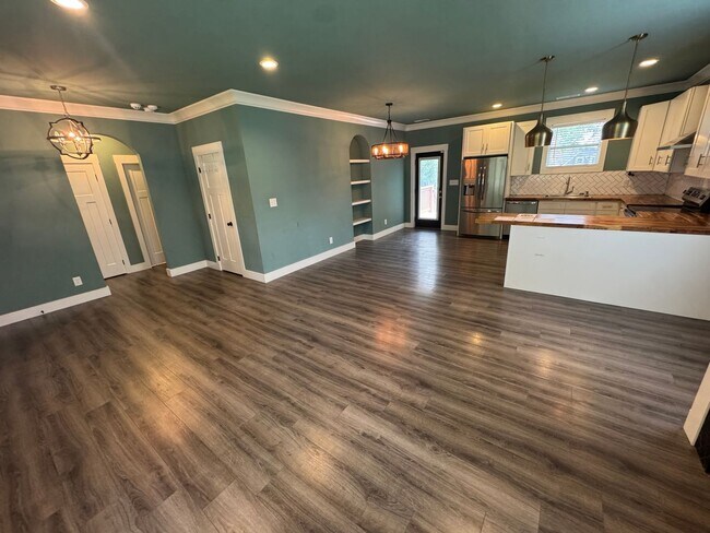 Building Photo - Modern Bungalow Charm: Designer Finishes & Expansive Backyard Living!