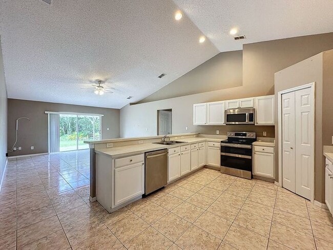Building Photo - Poinciana single family home in Village 7,...