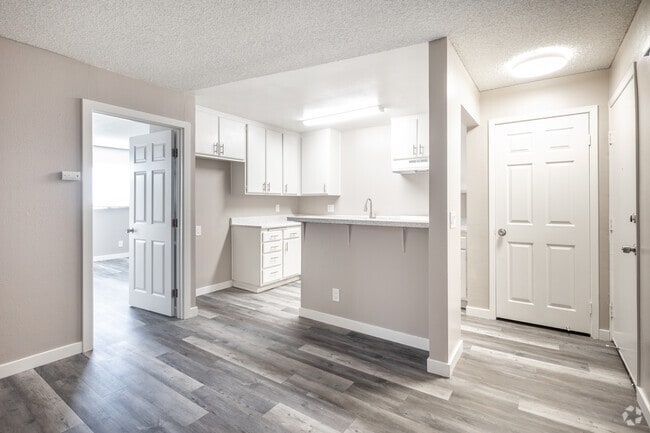 1BR, 1BA - 600SF - Living Space & Dining - Fountain Creek Apartments