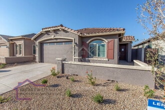 Building Photo - 9638 E Tesla Ave