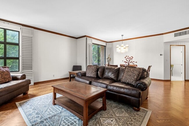 Building Photo - Elegant Corner Condo with Spacious Interiors