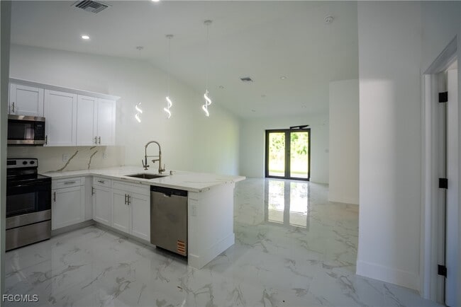 Building Photo - 4935 Leonard Blvd S