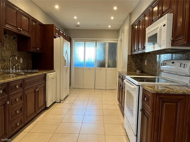 Foto del edificio - 4 br, 2.5 bath House - 4973 SW 91st Ter