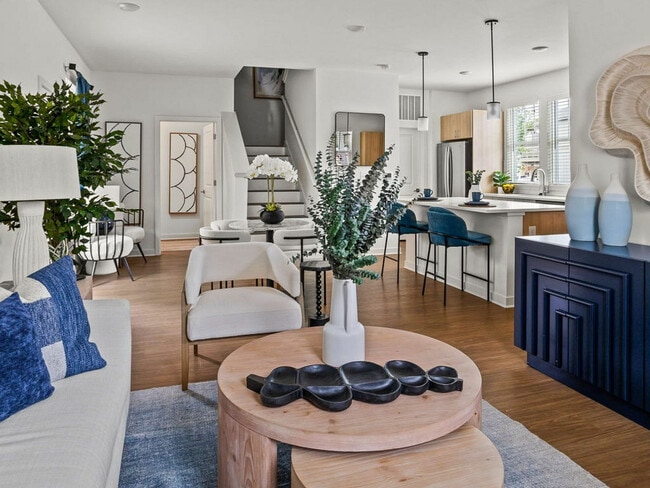 Sala de estar con diseño abierto - LEO at Carmel - SINGLE FAMILY RENTAL HOMES