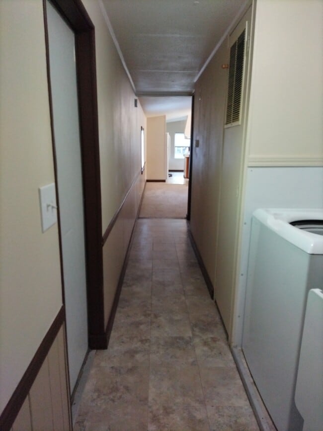 Hall, laundry on right - 15016 Frenchie Ln SE