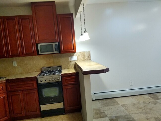 Foto del edificio - 49 E 129th St
