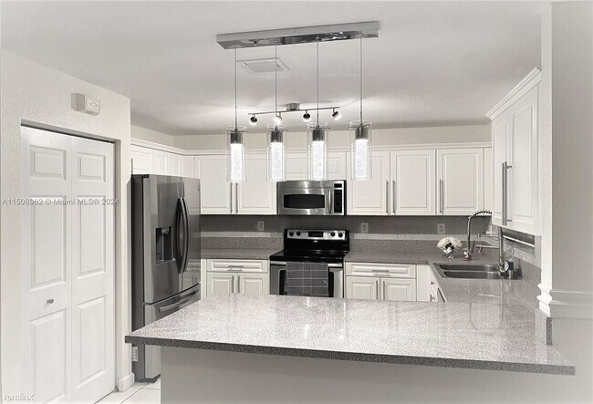 Foto del edificio - 4 br, 3 bath House - 13425 SW 122nd Ave