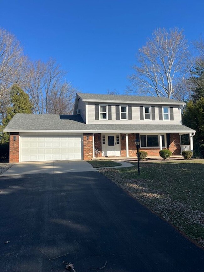 Building Photo - Spacious, Fully Updated Home with Walkout Basement on a Mature Lot