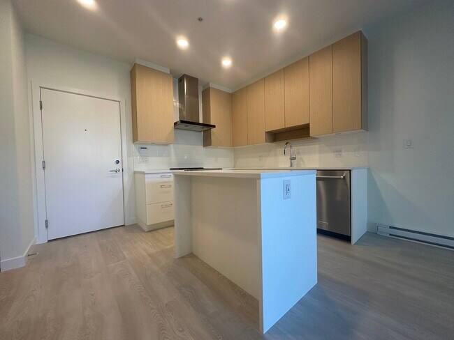 Building Photo - 104-7599 15th Street
