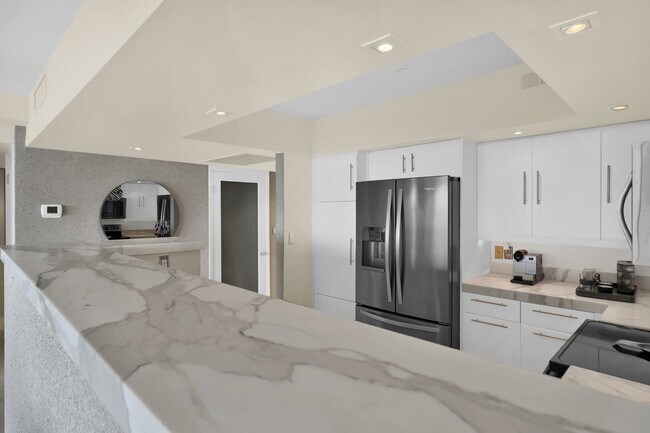 Building Photo - 5600 Collins Ave
