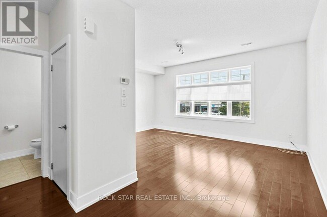 Building Photo - 1401-1401 Plains Rd E