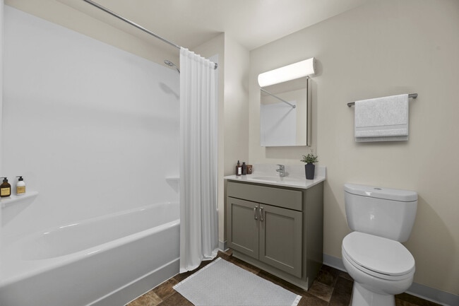 Well-appointed bathrooms with modern finishes at Mission Main. - Mission Main