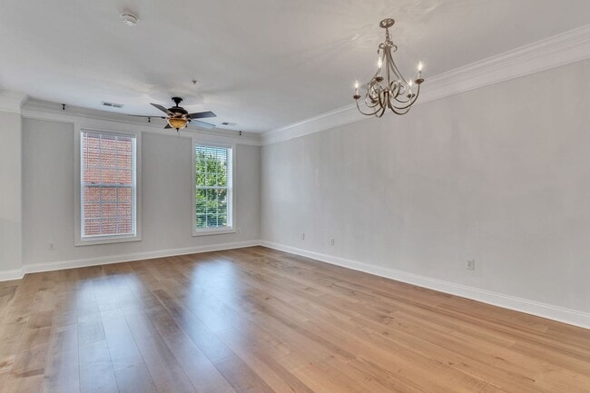Building Photo - Spacious End Unit with Garage in Gated Com...