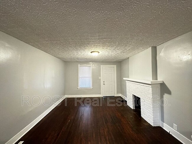 Building Photo - 1249 E 15th Ave