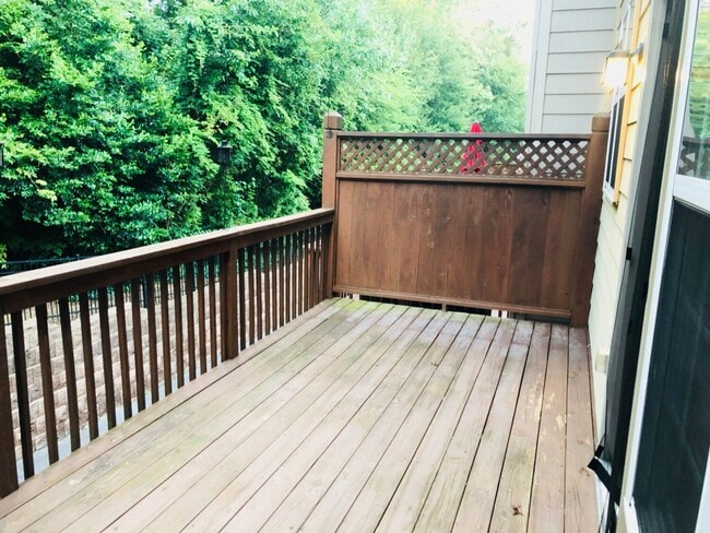 Deck (entrance from kitchen/breakfast area). Will be stained before tenant moves in. - 2289 Limehurst Dr