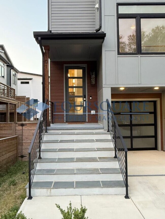 Foto del edificio - Modern 4-Bed Townhome with Designer Finishes, Dual Balconies & EV-Ready Garage – Inside the Beltl...