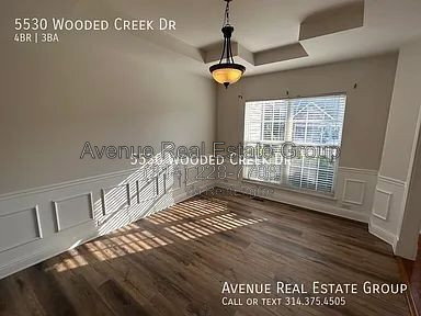 Foto del edificio - 5530 Wooded Creek Dr