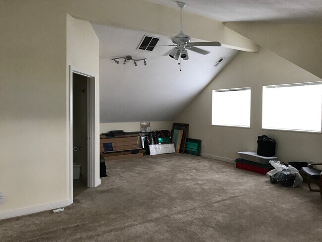 Upstairs master and bathroom on left - 2630 N Hayden Island Dr