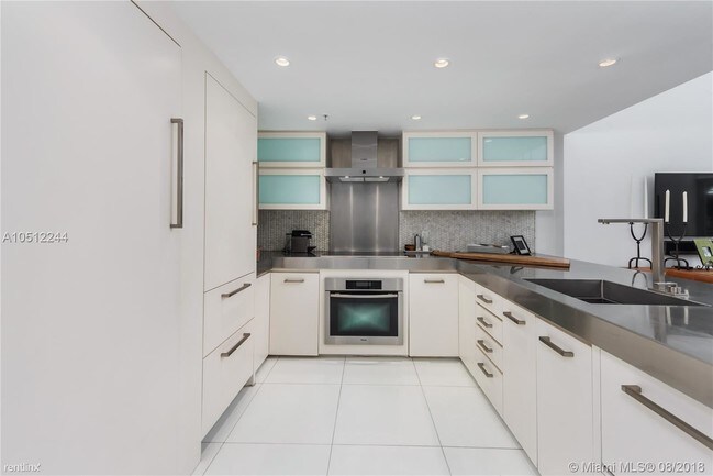 Foto del edificio - 1 br, 1.5 bath Condo - 7744 Collins Ave Apt 8