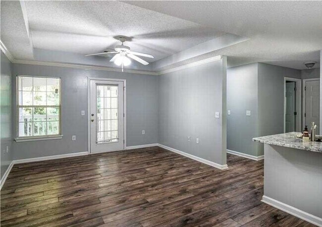 Building Photo - The Reserve at Woodbridge, Unit E220