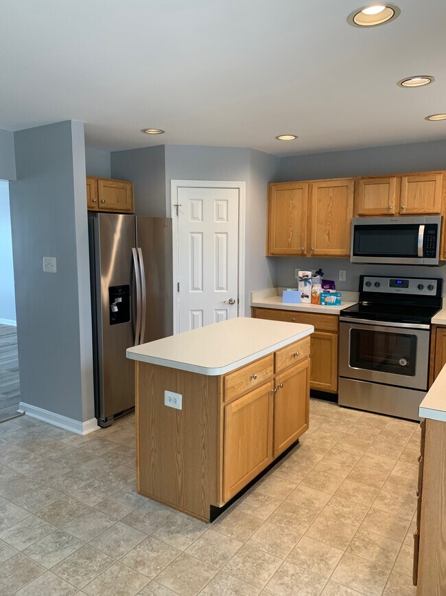 Kitchen with Stainless Appliances, Island and Large Pantry - 244 Country Ridge Dr