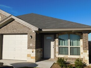 Building Photo - 703 Sladecek Dr