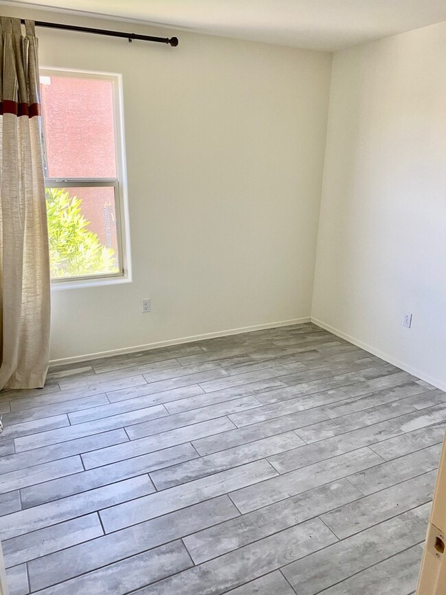 Building Photo - COMING SOON! New 3BR 2 BA Home w/ 2-Car Garage • Stainless Kitchen • Timer-Irrigated Yard in East...