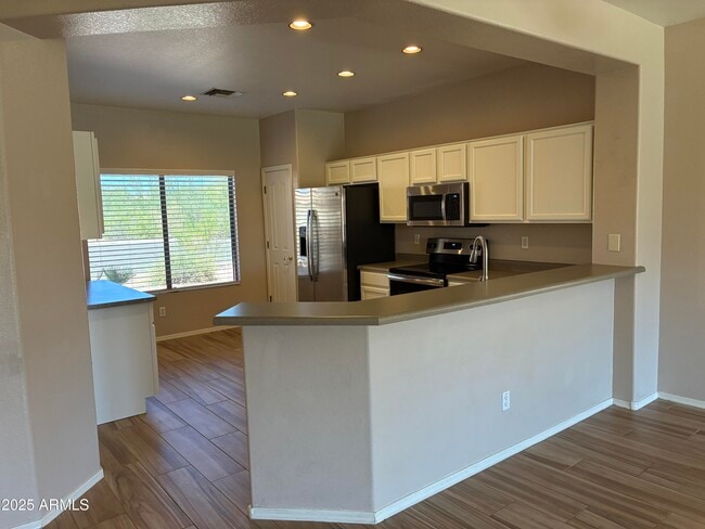 Building Photo - 6511 W Range Mule Dr