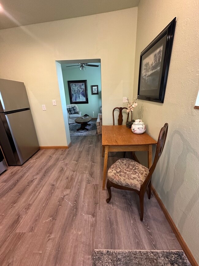 Dining room table and view into living room - 400 Main St