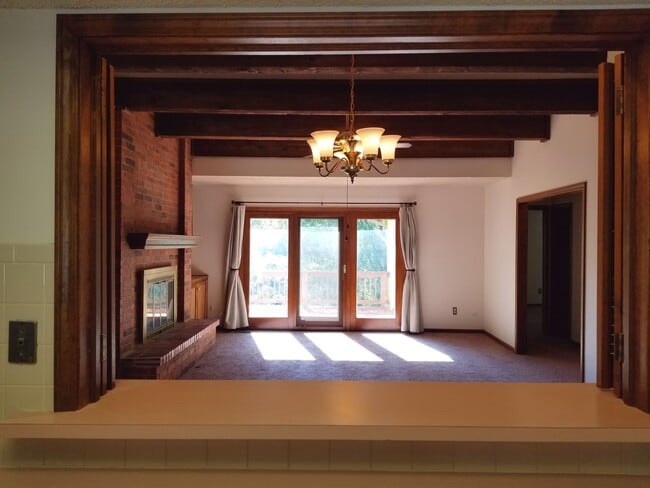 Main Living Room - view from kitchen opening - 3023 University Dr